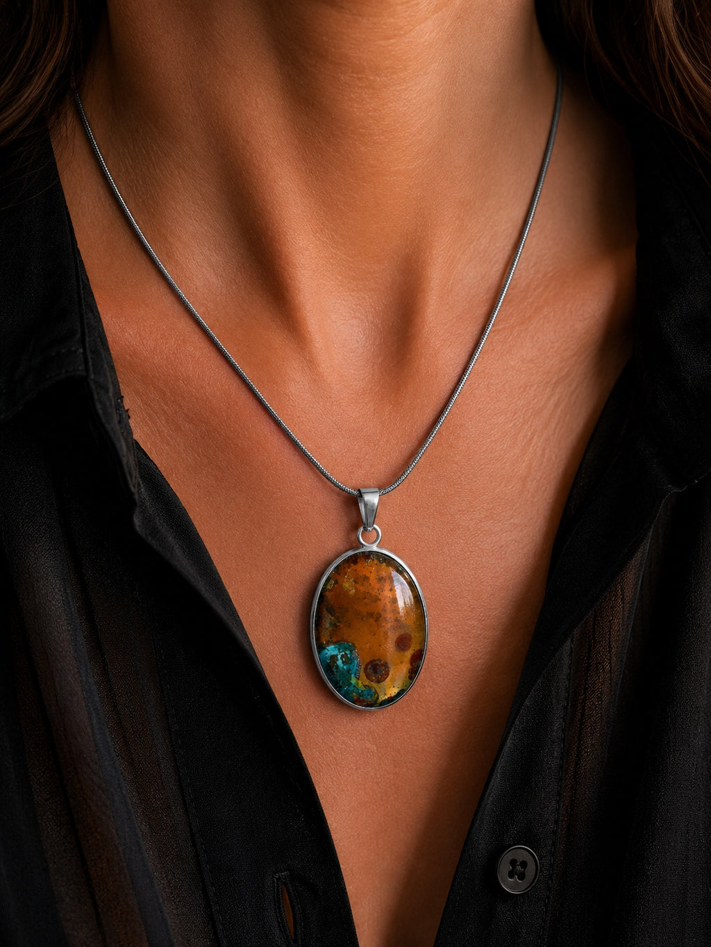The Copperologist Astral Archive wearable copper specimen pendant shown worn on an 18-inch stainless steel chain.