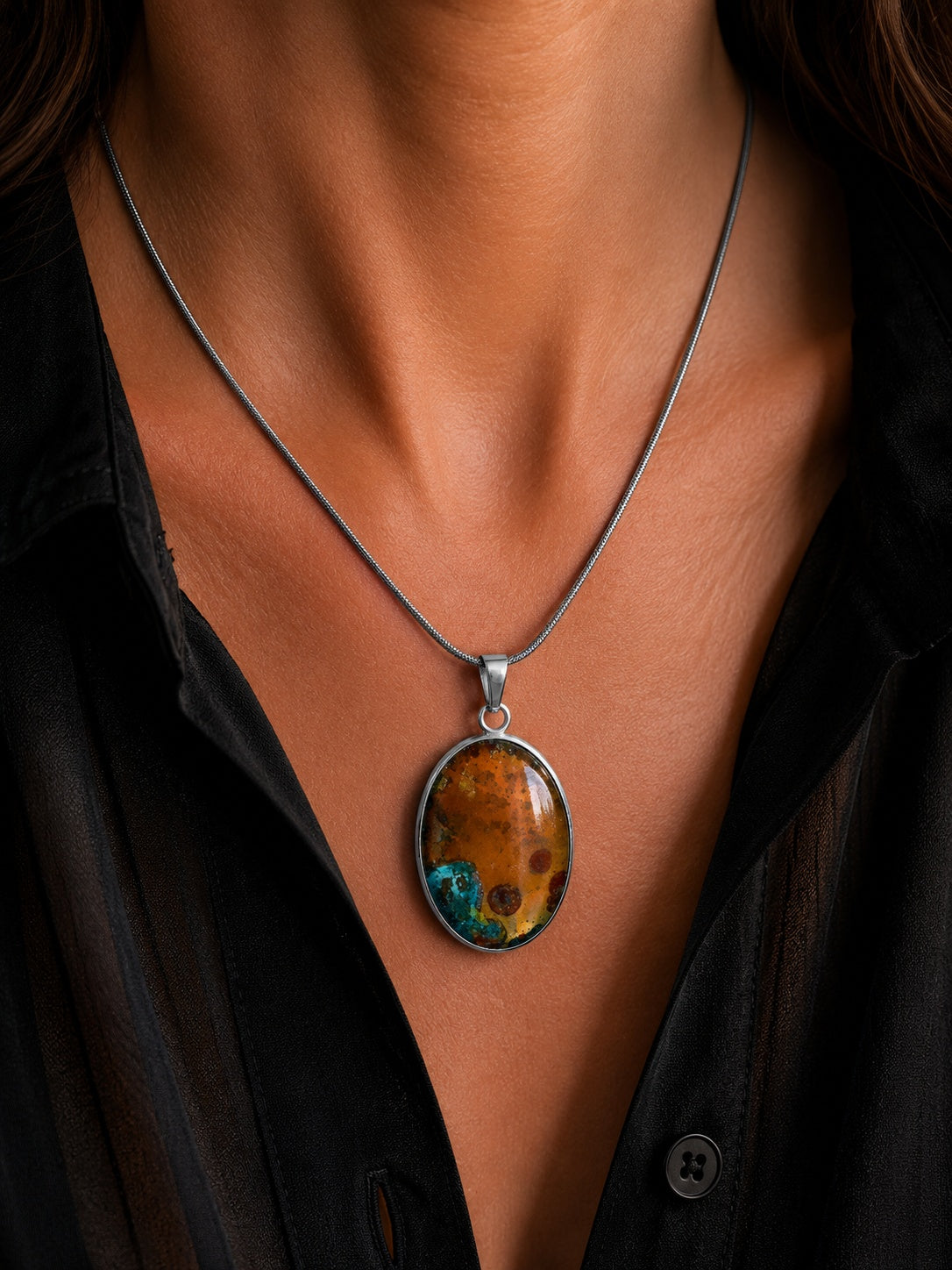 The Copperologist Astral Archive wearable copper specimen pendant shown worn on an 18-inch stainless steel chain.