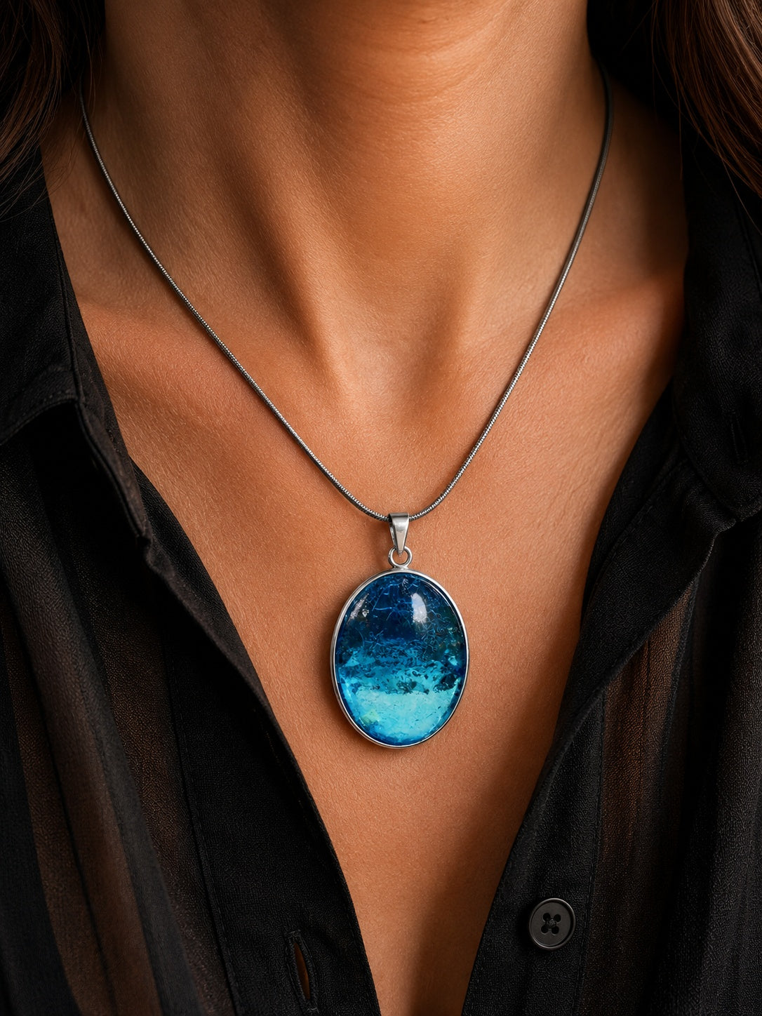 The Copperologist Azure Artefact wearable copper specimen pendant shown worn on an 18-inch stainless steel chain.