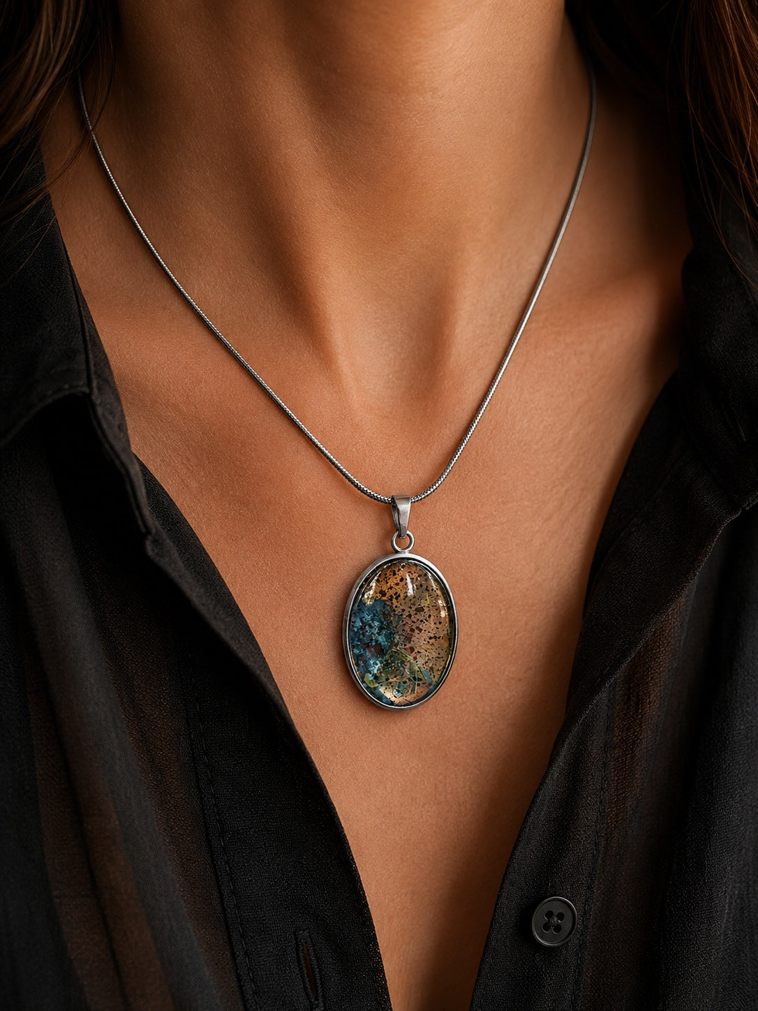 The Copperologist Copper Cove wearable copper specimen pendant shown worn on an 18-inch stainless steel chain.