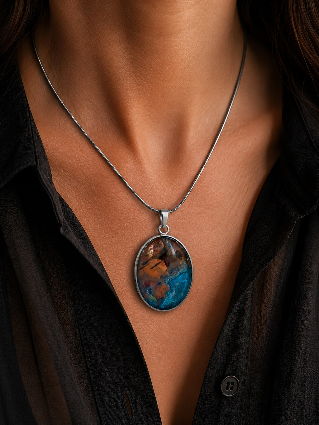 The Copperologist Fragmented Tide wearable copper specimen pendant shown worn on an 18-inch stainless steel chain.