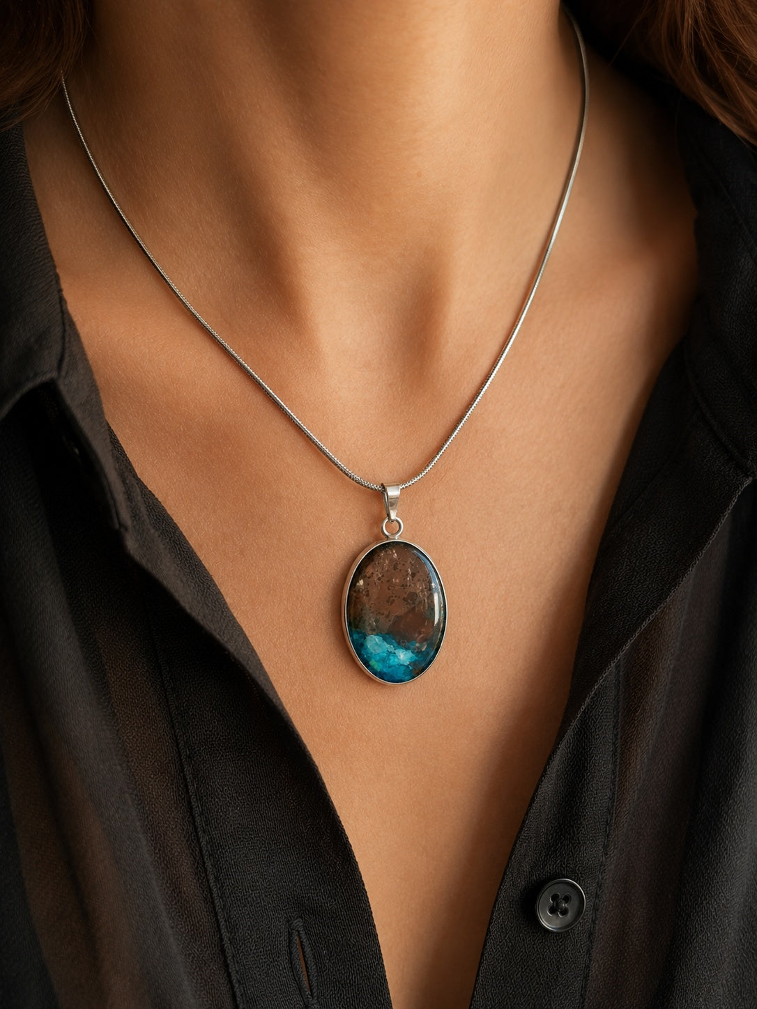 The Copperologist Harbour Light wearable copper specimen pendant shown worn on an 18-inch stainless steel chain.