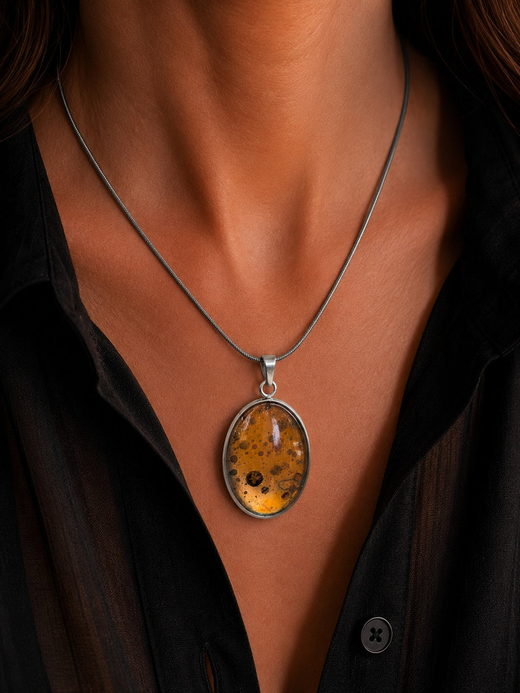 The Copperologist Wayfinder's Gold wearable copper specimen pendant shown worn on an 18-inch stainless steel chain.