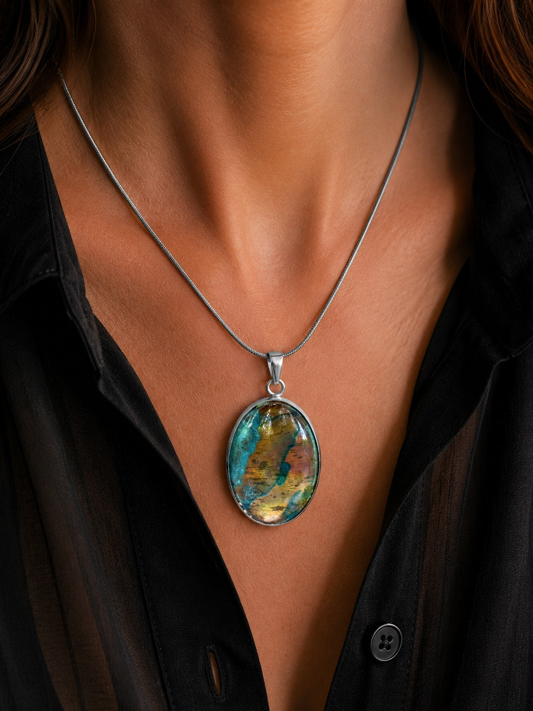 The Copperologist Forgotten Atlas wearable copper specimen pendant shown worn on an 18-inch stainless steel chain.