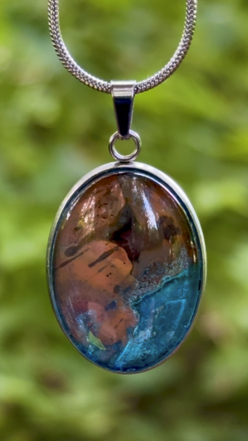 Torchbearer Twelve Fragmented Tide wearable copper specimen pendant featuring flowing turquoise, cream and copper formations suggestive of an abstract seascape shaped by time and transformation